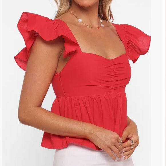 Lyric Ruffle Cotton Babydoll Top
Petal & Pup red - Picture 3 of 5